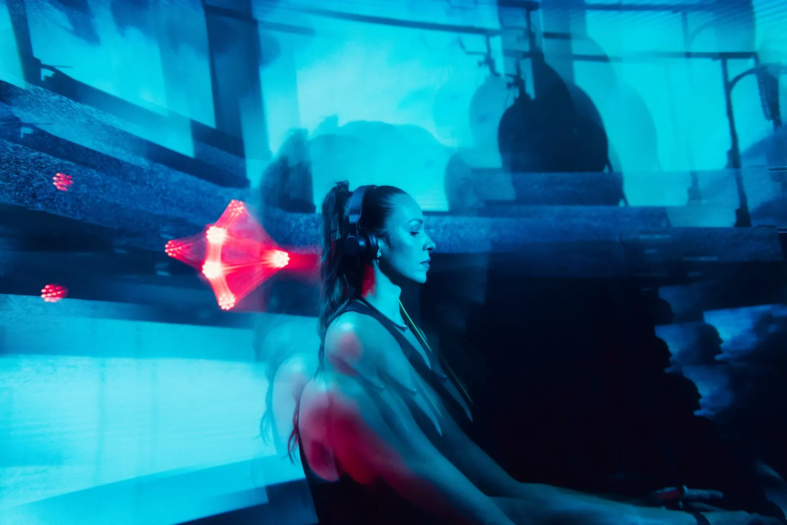 Andrømeda performing a techno DJ set at INPUT High Fidelity Dance Club in Barcelona during the Brunch Electronik Festival 2026 afterparty.